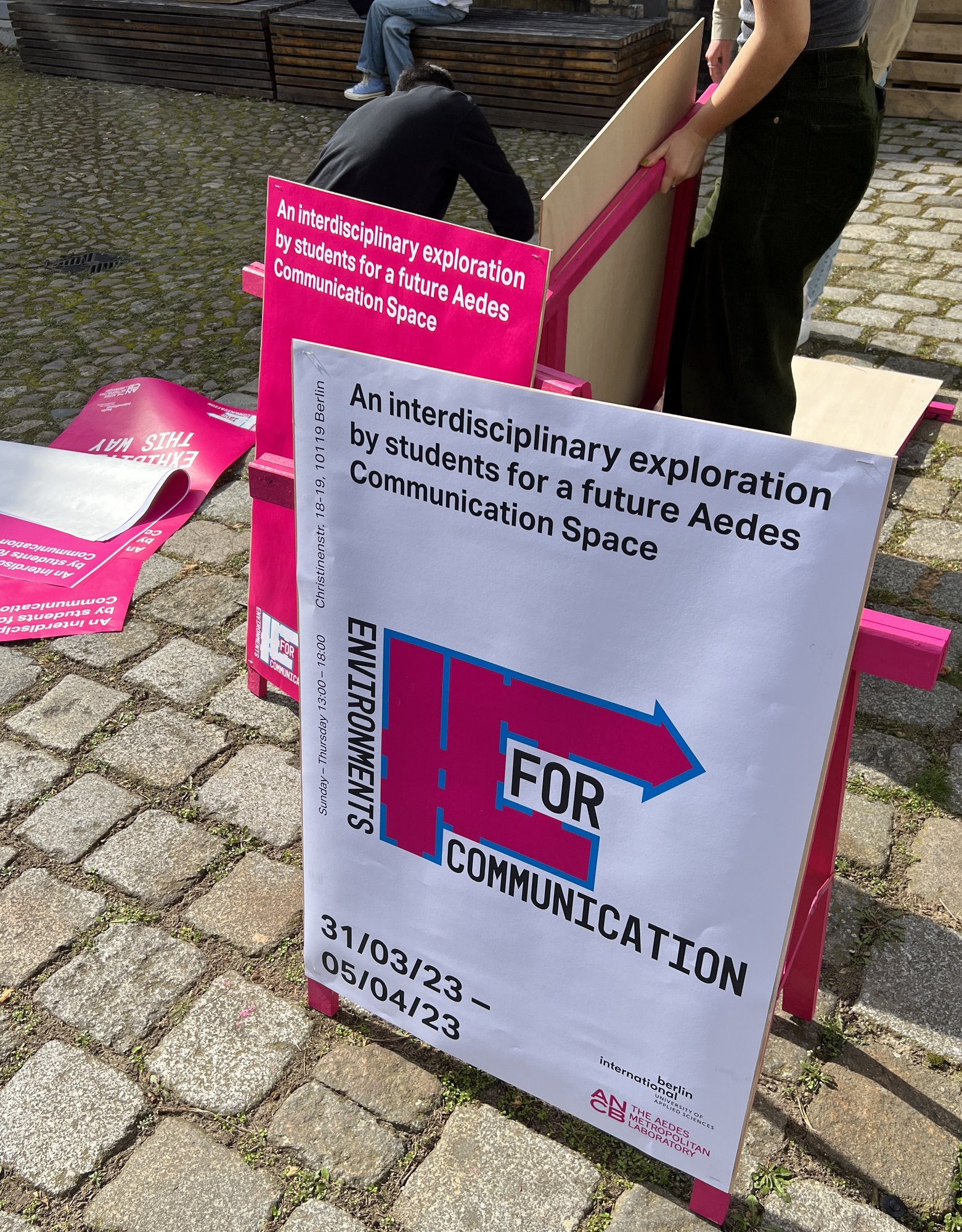 Aedes exhibition signage being assembled on-site